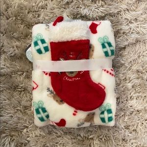 Baby’s first Christmas stocking and blanket